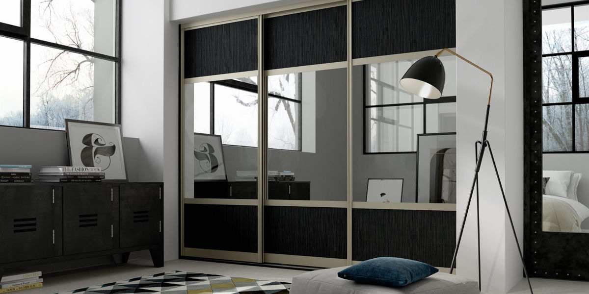 Black mirror with champagne frame sliding doors