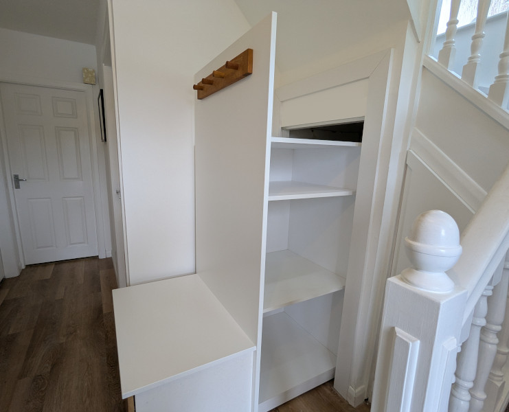 Wheel out under stairs storage with integrated seat in Cheshire